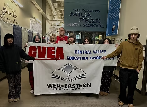 Mica Peak High School staff with CVEA banner
